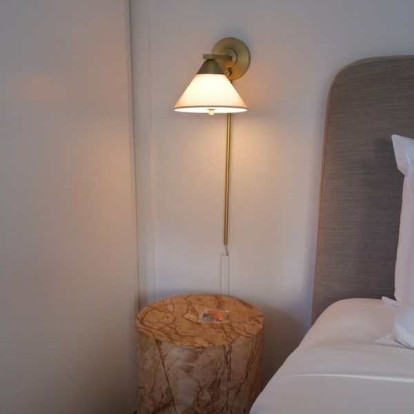 Enhance Bedroom Ambiance with Soft Glow Fabric Wall Sconce