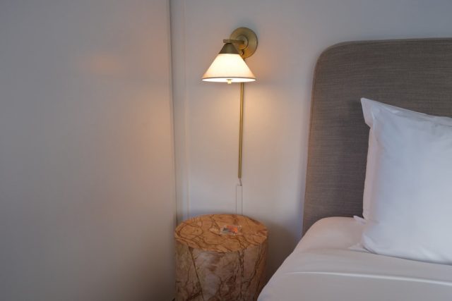 Enhance Bedroom Ambiance with Soft Glow Fabric Wall Sconce